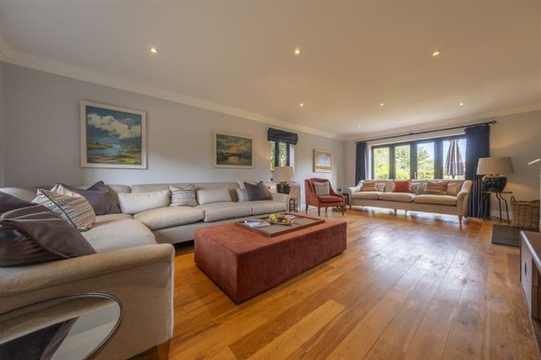 Ample comfy seating in the sitting room at 17 Peddars Way, Holme-next-the-Sea in  Norfolk