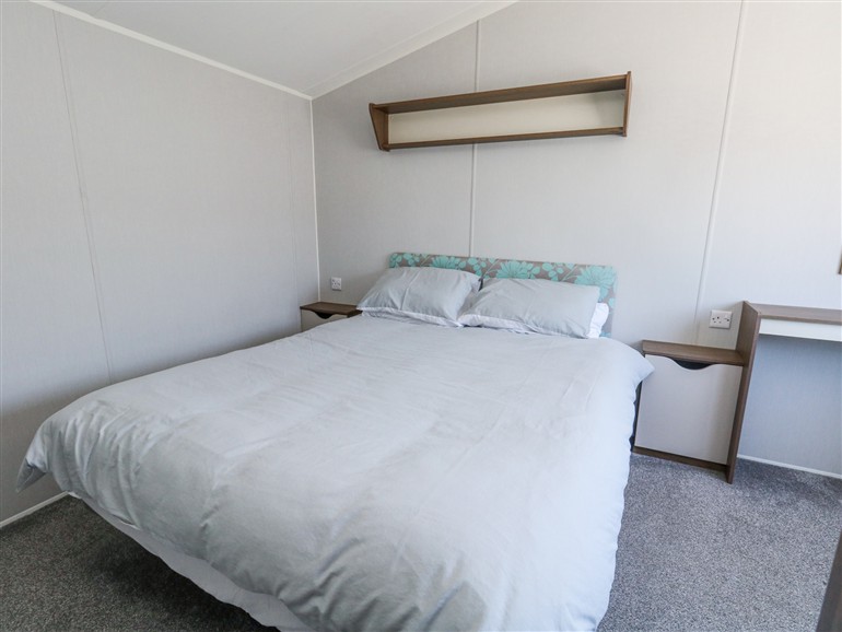 One of the bedrooms at 13 Sunset Terrace Rockley Park in Poole