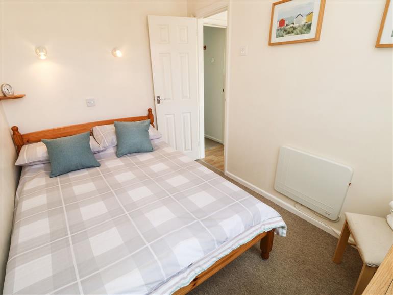 This is a bedroom at Drake Cottage in Seaview