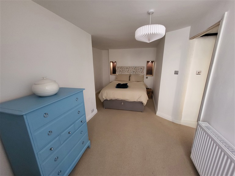 This is a bedroom at Fishermans Locker in West Bay
