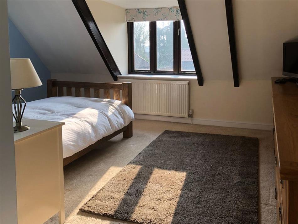 Bedroom in Lobelia Cottage, Stoke Holy Cross, near Norwich