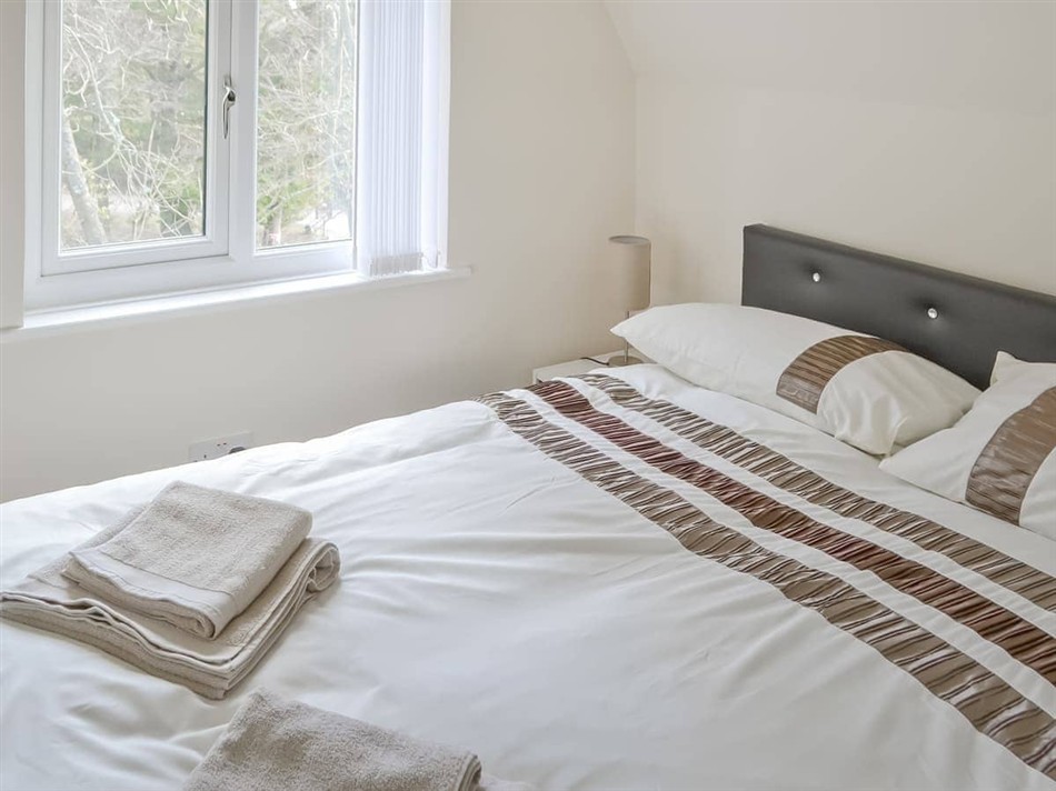Bedroom in Squirrel Lodge, Otterburn