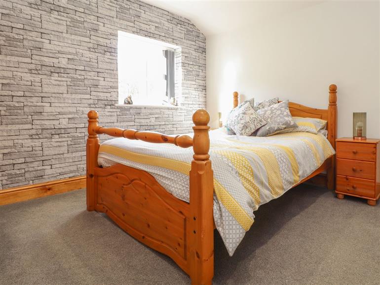 This is a bedroom at Orchard Leigh in Bridge near Portreath