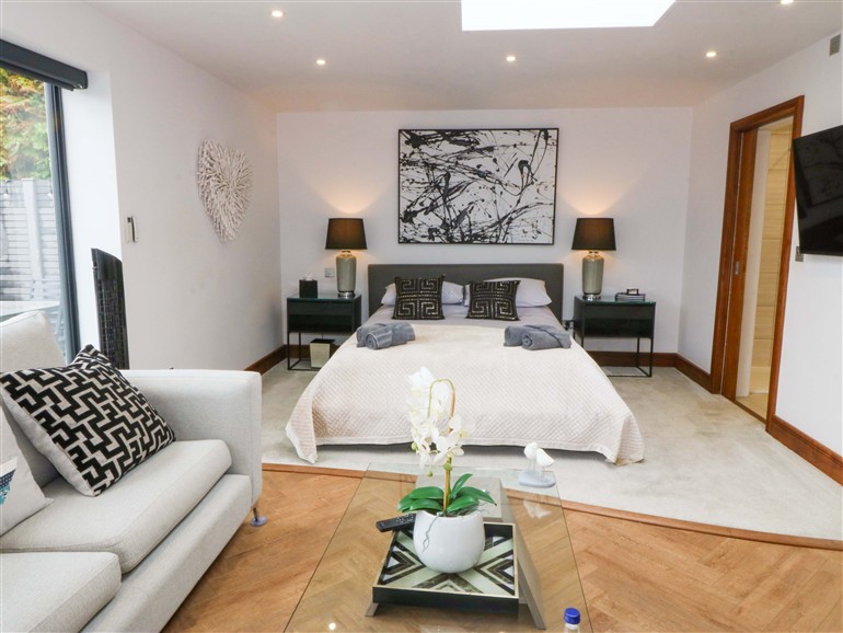 One of the bedrooms at The Lodge at Dafarn Newydd in Llangefni