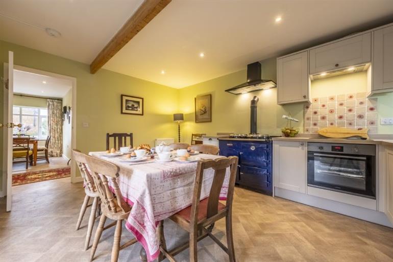 Kitchen with breakfast table at The Old Coach House, Congham in  Norfolk