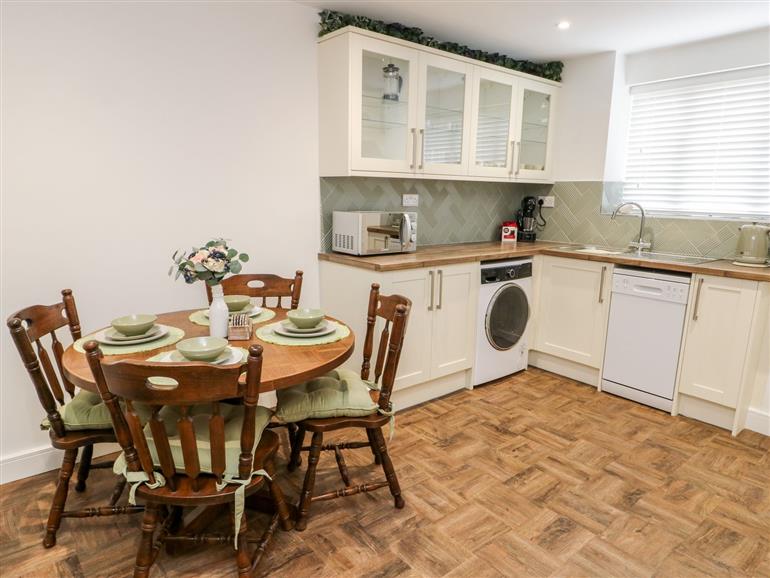 This is the kitchen at Y Goedwig in Newborough