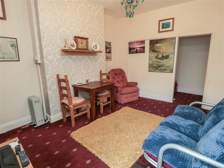 This is the living room at 170 Victoria Road in Scarborough