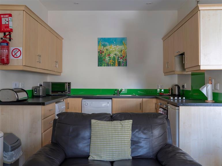 The living room at 1B Cathedral View Apartments in Longford