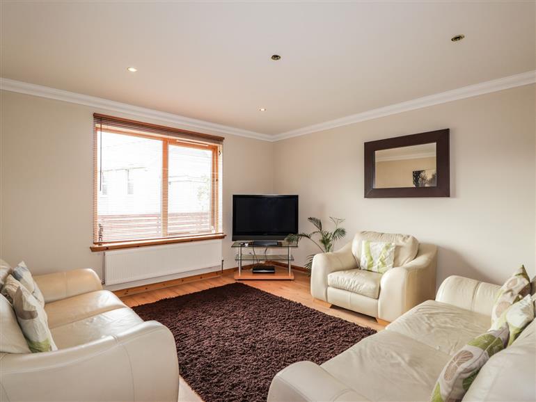The living room at 2 Braeview in Wester Balblair near Beauly