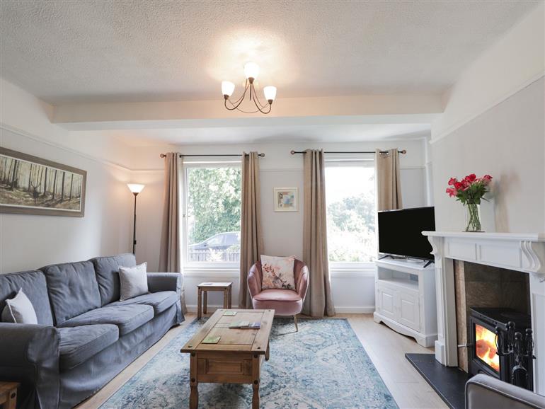 This is the living room at 2 Riverside in Foyers