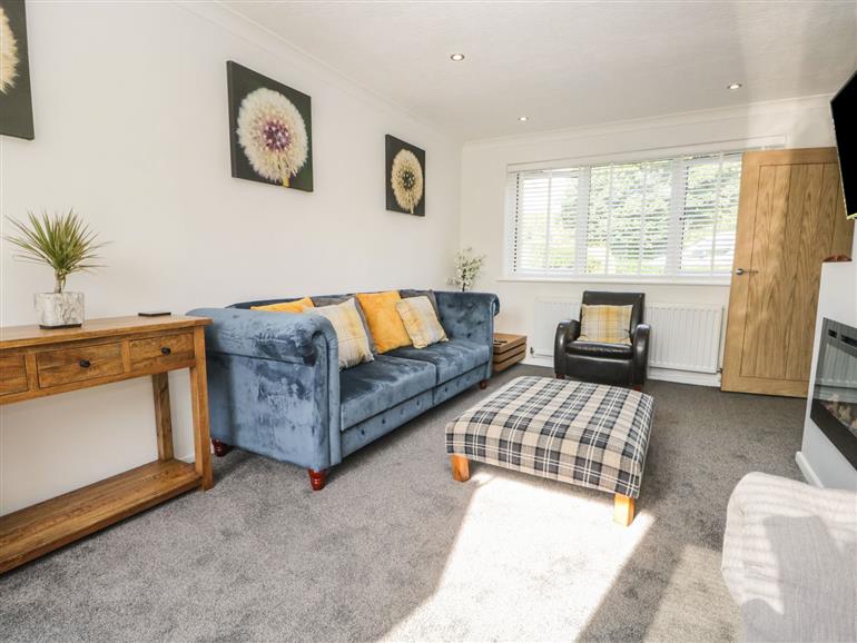 The living room at 26 Hycemoor Way near Millom