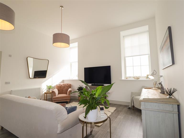 The living room at 35 Great Glen Place in Inverness