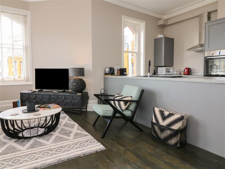The living room at 7 Belgrave Apartments in Ilfracombe