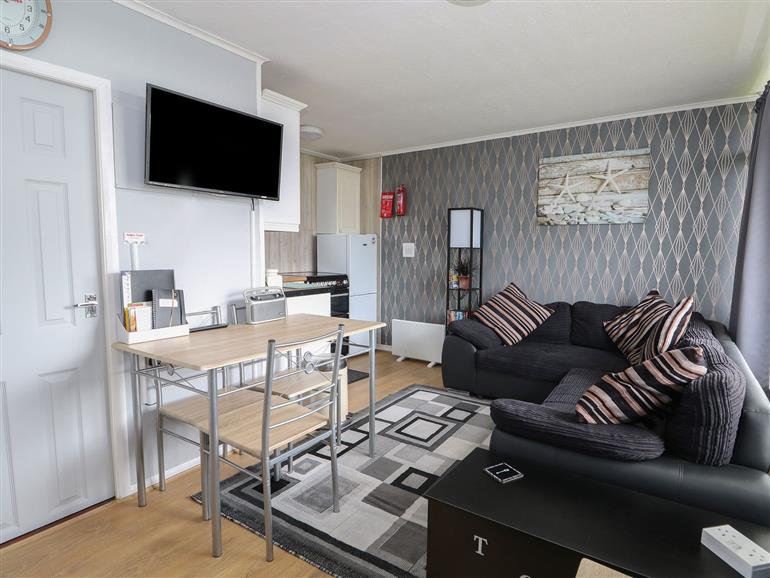 The living room at 98 Cherry Park in Chapel St Leonards