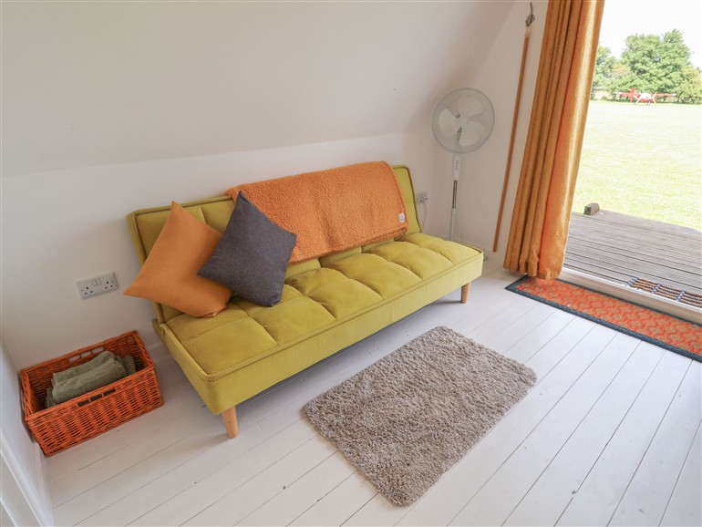 The living room at A-frame near Otley