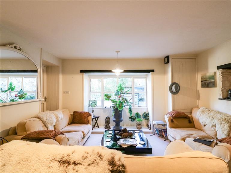 The living room at Bacchus Barn in Bolberry