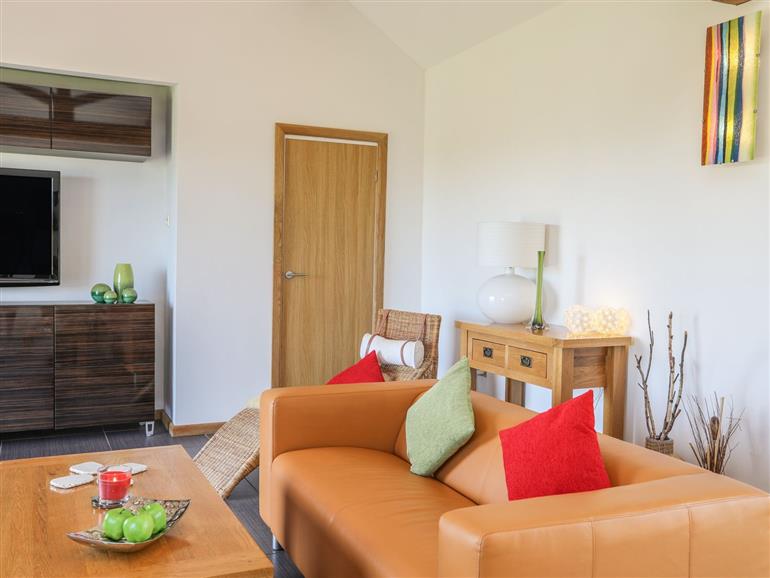 The living room at Barn Owl near Benllech