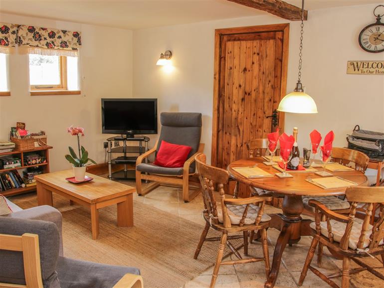 This is the living room at Beekeeper’s Cottage in Broxwood near Pembridge