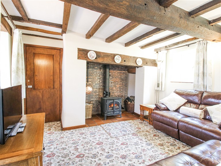 The living room at Caradoc Cottage in Church Stretton