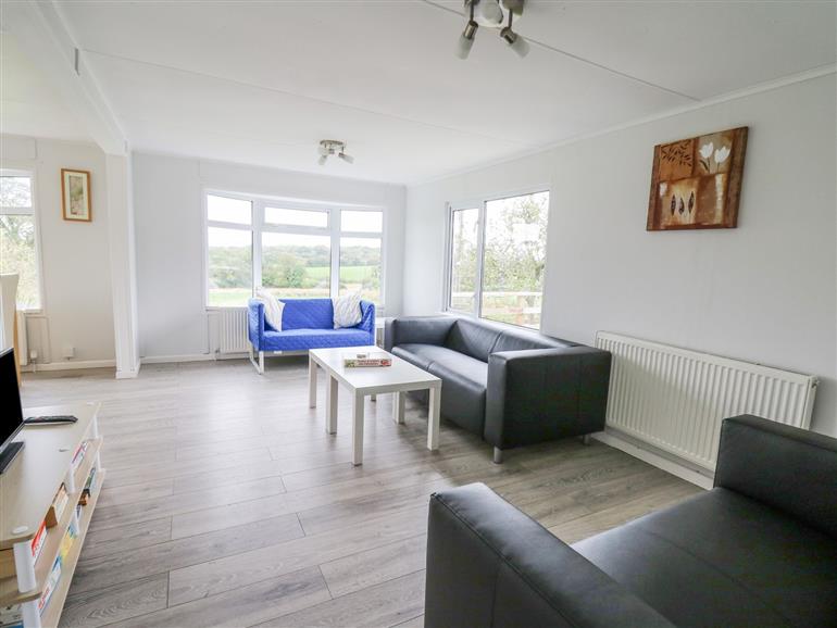 The living room at Chalet Lan in Broad Oak near Llandeilo
