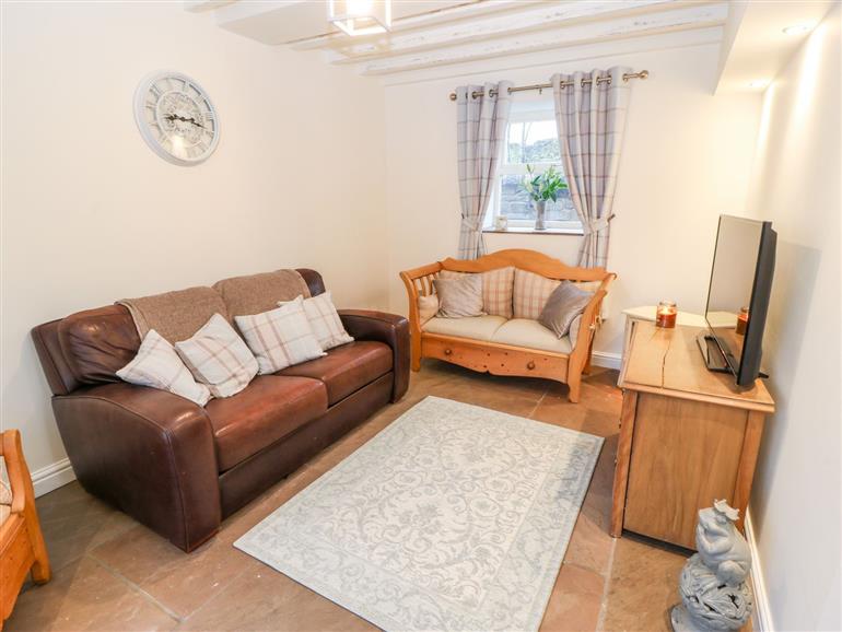 The living room at Clock Cottage in Lydgate near Saddleworth