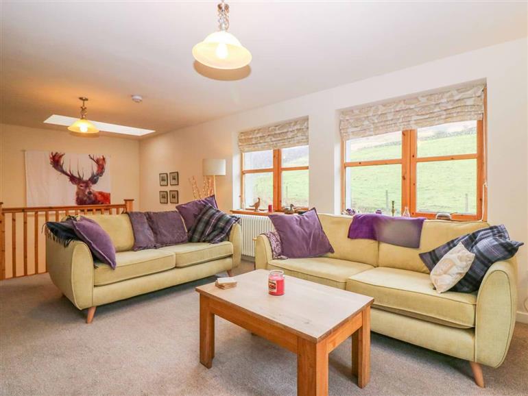 The living room at Drimnatorran Farm Lodge in Strontian