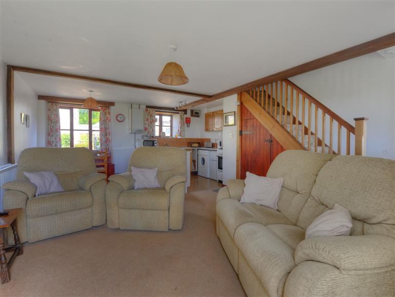The living room at Honeysuckle Cottage in Lyme Regis
