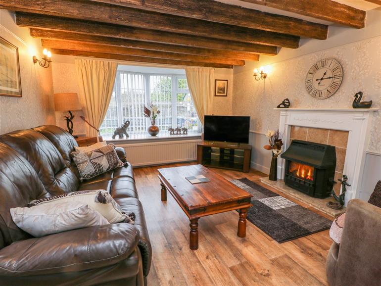 Living room in 11A High Street, Burniston