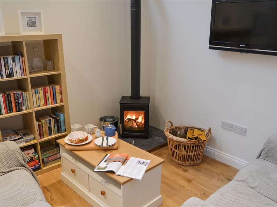 Living room in Blyth Green Stable, Wacton, near Long Stratton