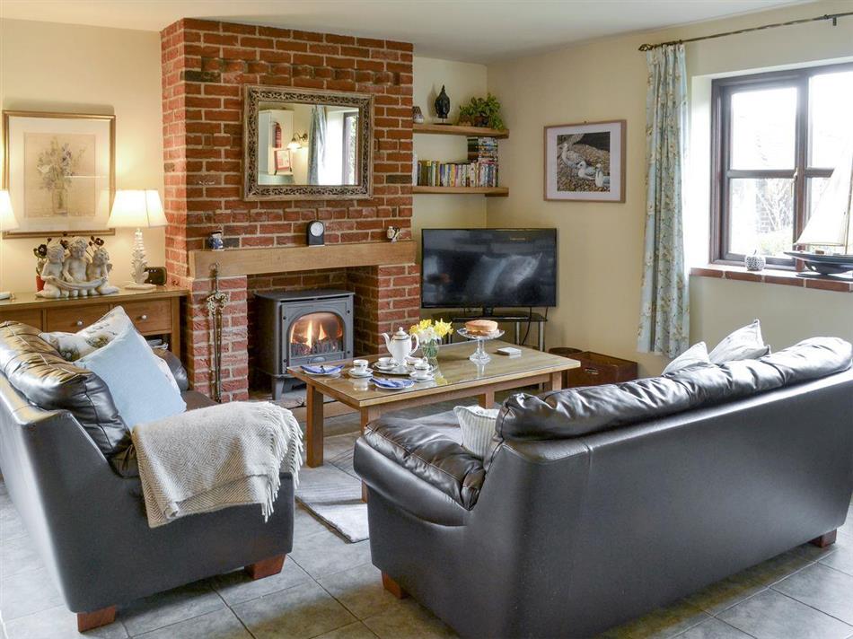 Living room in Riverside Cottage, Old Costessey, Norfolk