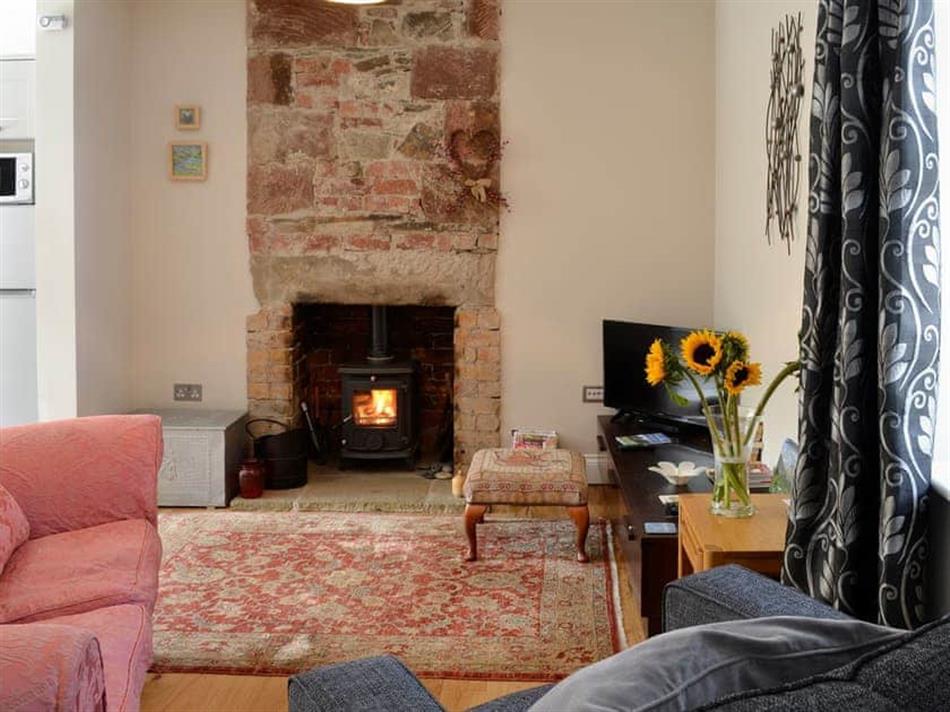 Living room in Tan How Dyke Cottage, Setmurthy, near Bassenthwaite