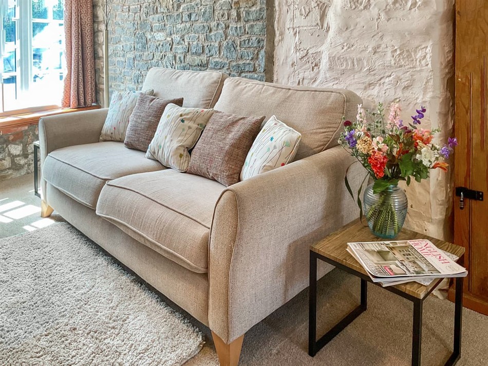 Living room in The Old Post House Annex, Axbridge, near Weare