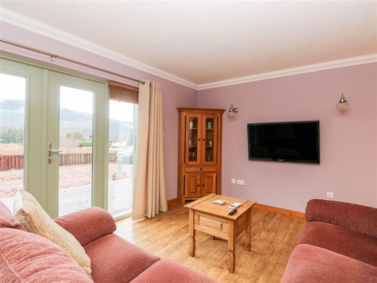 The living room at Little Tigh Clovelly in Spean Bridge