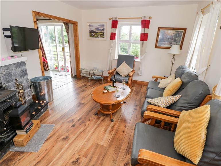 The living room at Lough Mask Road Fishing Cottage in Ballinrobe