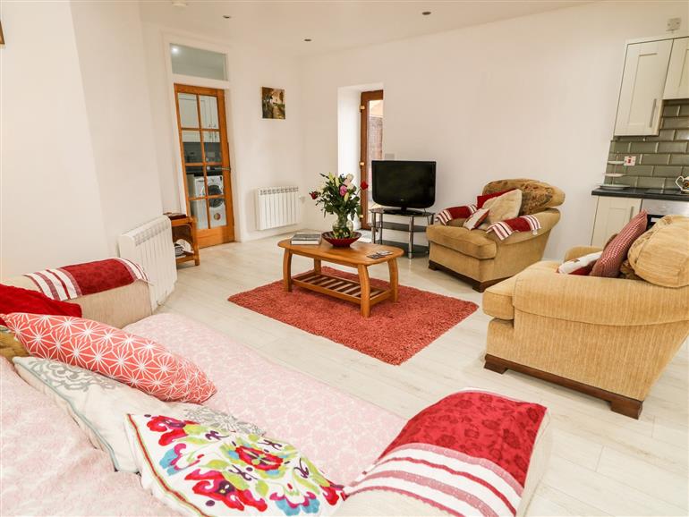 The living room at May’s Cottage in Bushmills
