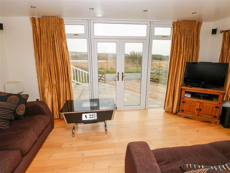 This is the living room at Pickleridge View in Dale