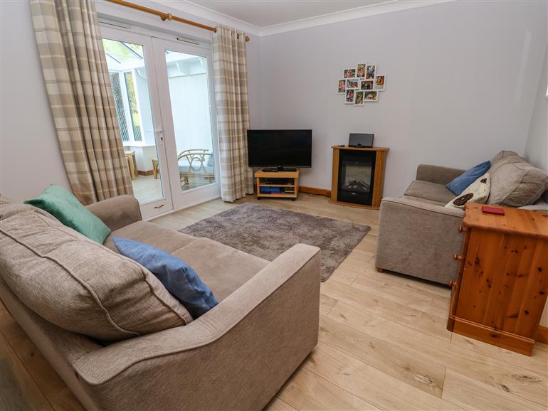 The living room at Primrose Cottage in Goldenbank near Falmouth