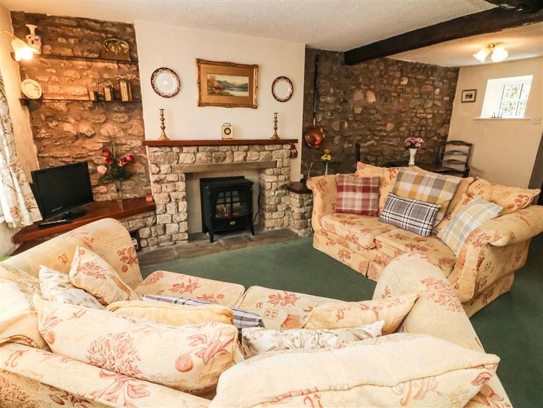 The living room at Rose Cottage in Burton-In-Kendal