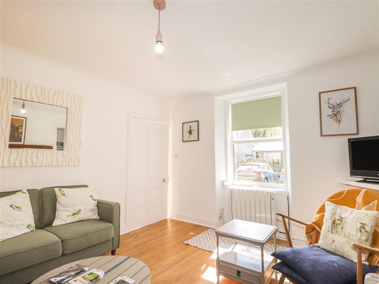 The living room at Rose Cottage in Grantown-On-Spey