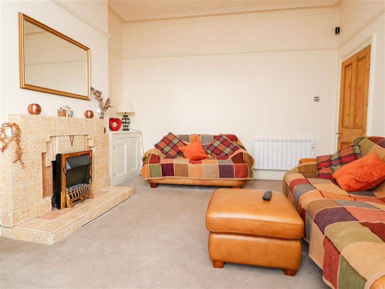 This is the living room at Sandylands Seaview in Morecambe