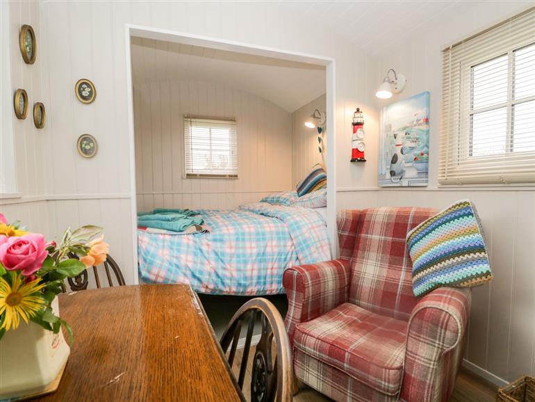 This is the living room at Seashore Shepherds Hut @ Moat Farm in Aldingham near Ulverston