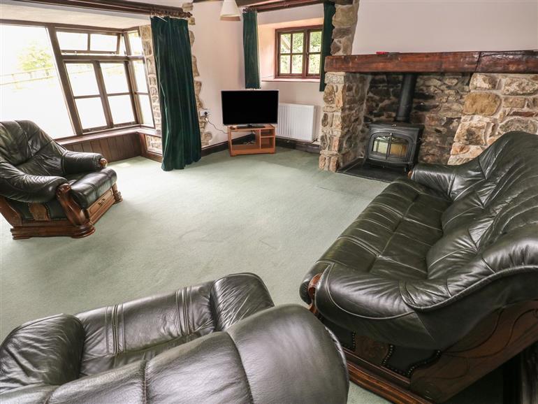 This is the living room at The Farmhouse in Rhydlewis near Brynhoffnant