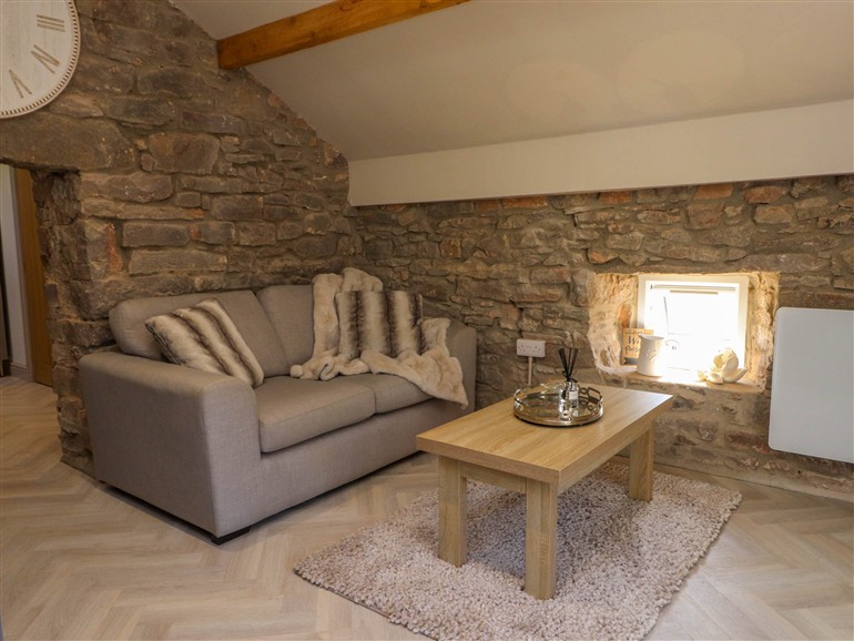 The living room at The Hayloft in Llysfaen