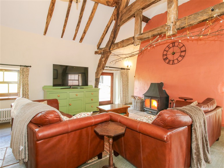 The living room at The Long House near Trefonen