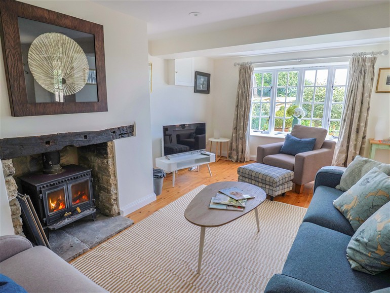 The living room at Tithe Barn Cottage in Litton Cheney near Burton Bradstock