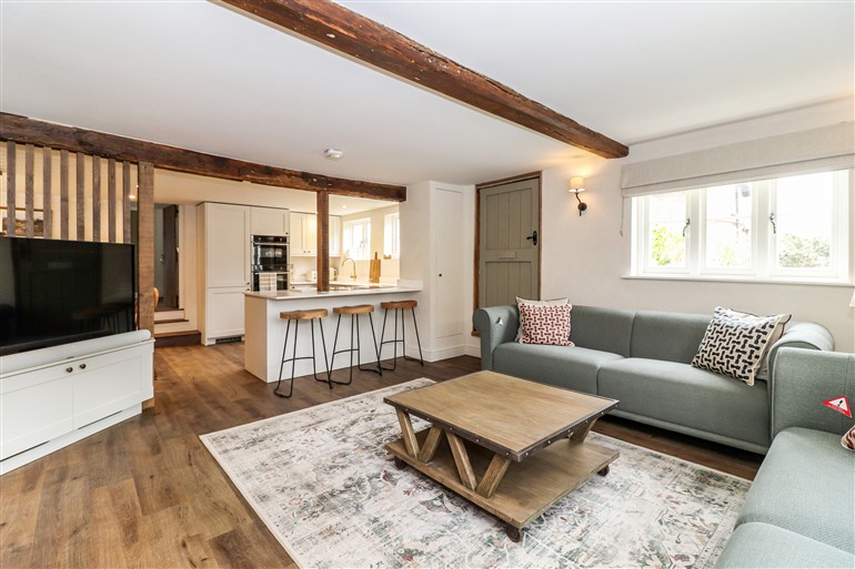 This is the living room at Tuffs Farm Cottage in Chipperfield