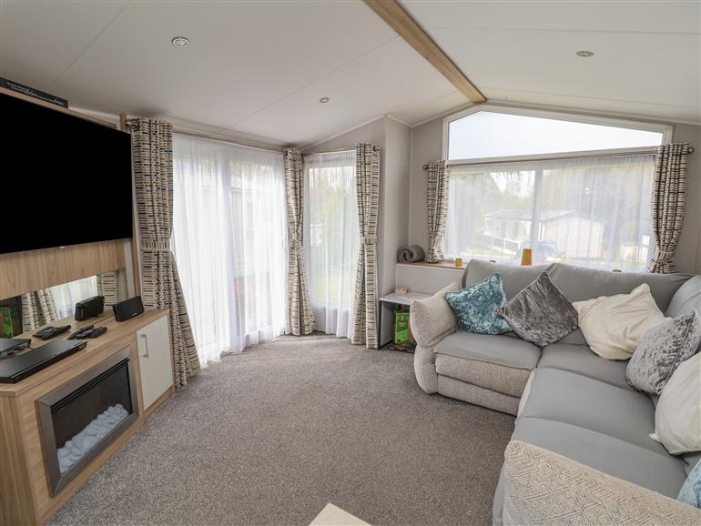 The living room at Woodlands Lodge in Bontuchel near Ruthin