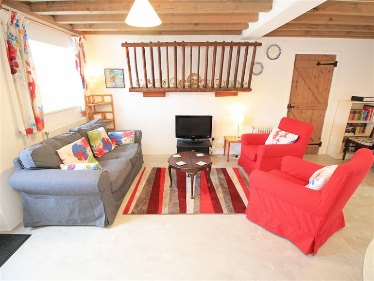 This is the living room at Y Beudy (The Old Byre) in Llanbedr