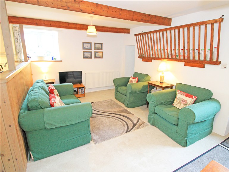 The living room at Y Stabl (The Old Stable) in Llanbedr