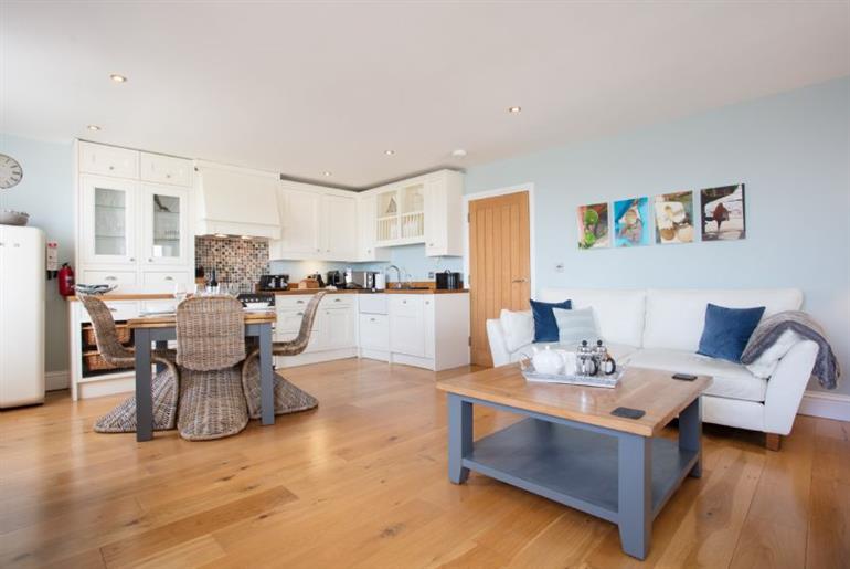 Open-plan sitting/dining room at 8 Fernhill, Carbis Bay in Cornwall